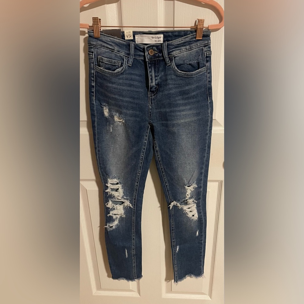 Buckle Women's Distressed Blue Jeans